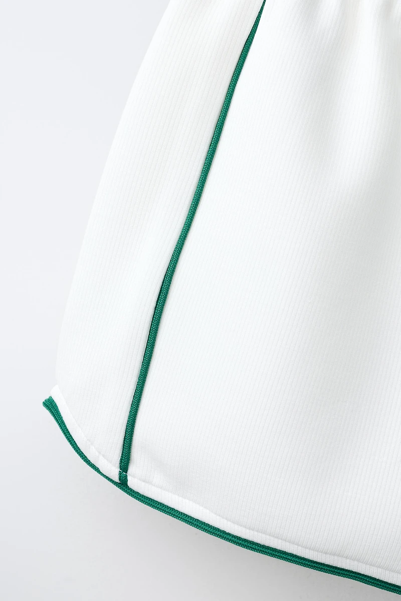 RIBBED SHORTS WITH CONTRAST PIPING