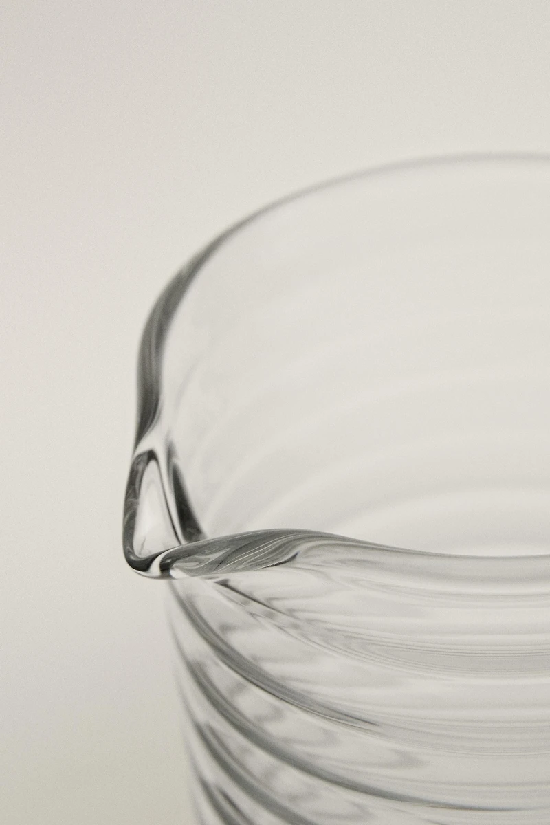 GLASS PITCHER WITH RAISED LINES