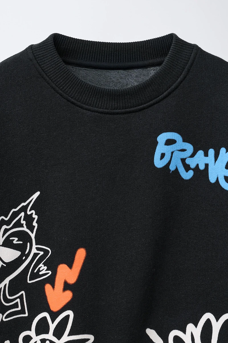 SWEAT IMPRIMÉ GRAFFITIS