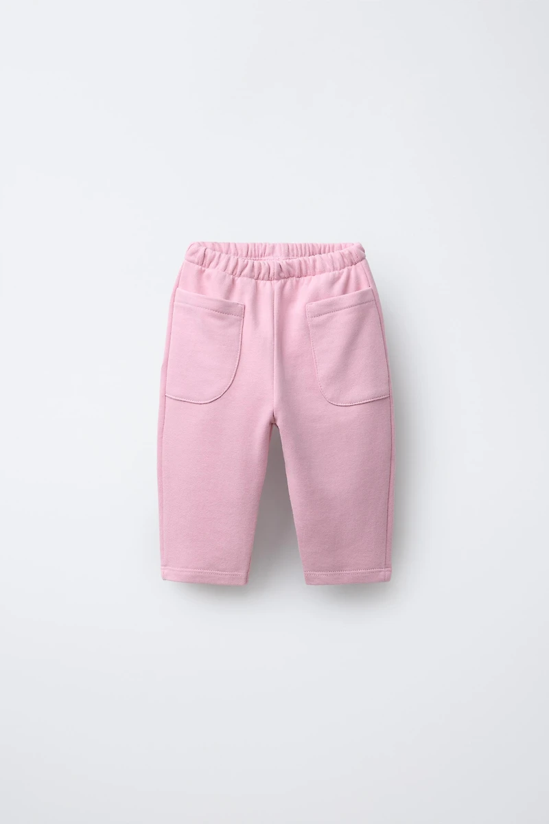 PANTALON EN MOLLETON BAGGY AVEC ÉTIQUETTE