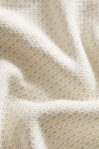 TEXTURED BATH TOWEL WITH TOPSTITCHING