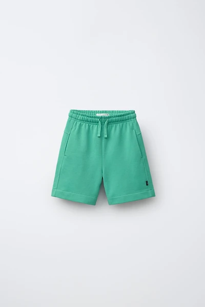 SHORT EN MOLLETON UNI