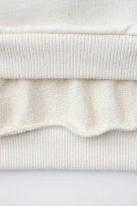 SWEAT À INSCRIPTION IMPRIMÉE POIS