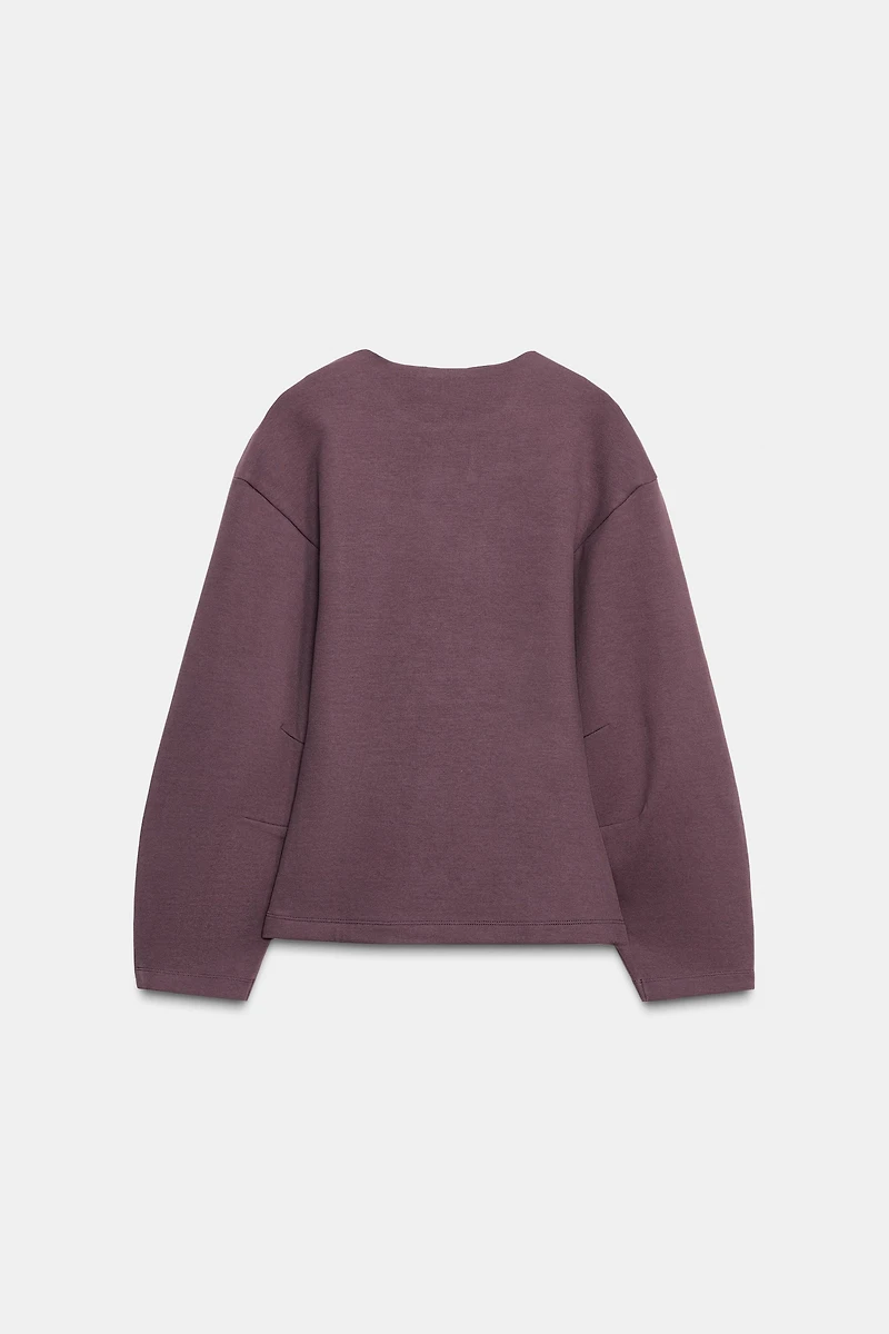 INTERLOCK JUMPER WITH DARTS