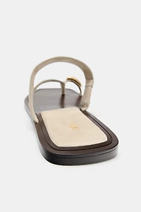 LEATHER SANDALS WITH METAL DETAIL