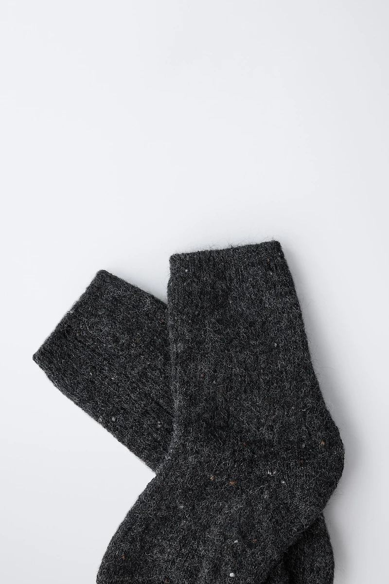 CHAUSSETTES BOUTONNÉES