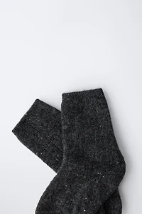 CHAUSSETTES BOUTONNÉES