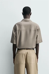 TECHNICAL ZIP POLO SHIRT