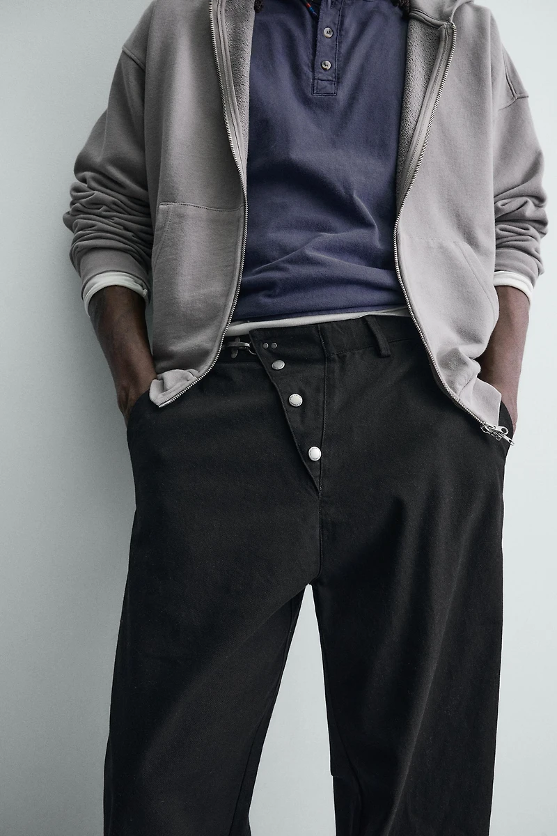 PANTALON COUPE LARGE FERMETURE BRANDENBOURG
