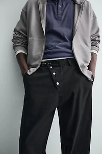 PANTALON COUPE LARGE FERMETURE BRANDENBOURG