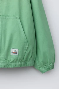 BLOUSON CAPUCHE ÉTIQUETTE