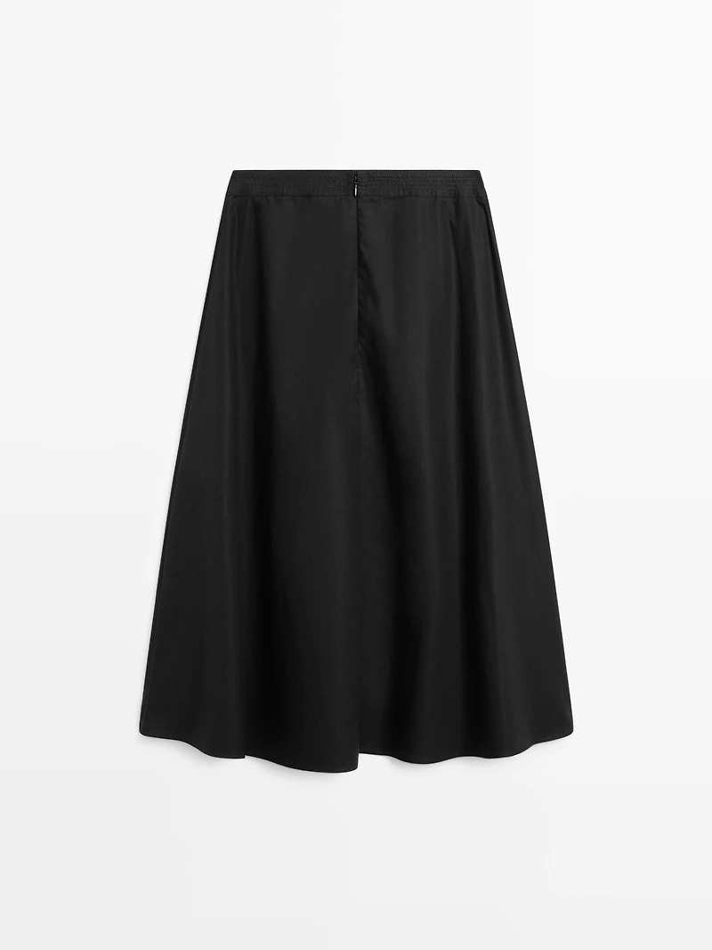 Jupe midi taille marquée