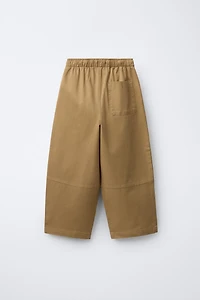 PANTALON BALLON AVEC SURPIQÛRES