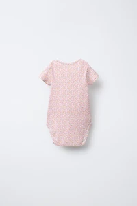 FIVE-PACK OF PATCHWORK BODYSUITS