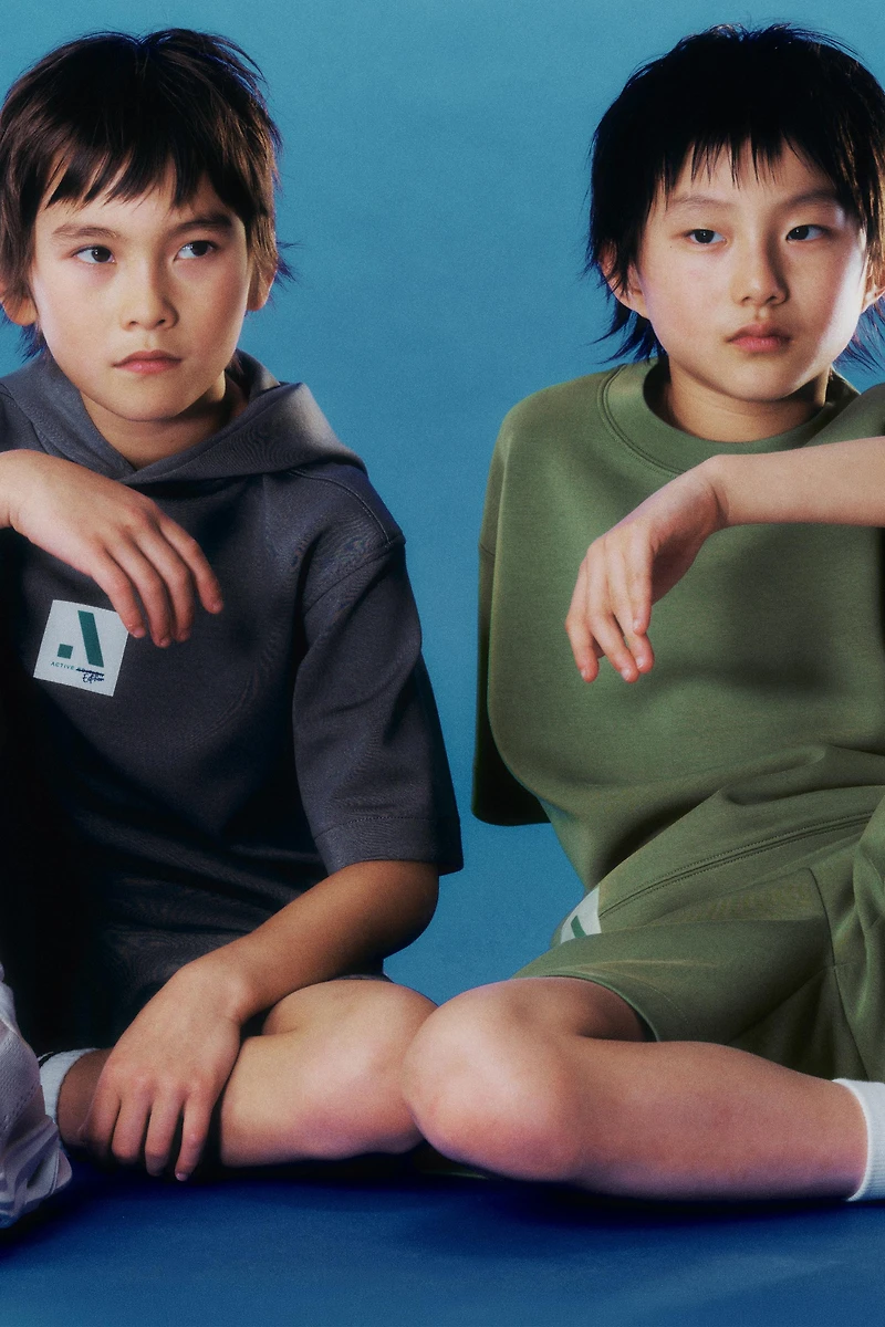 SHORT SPORT À LOGO
