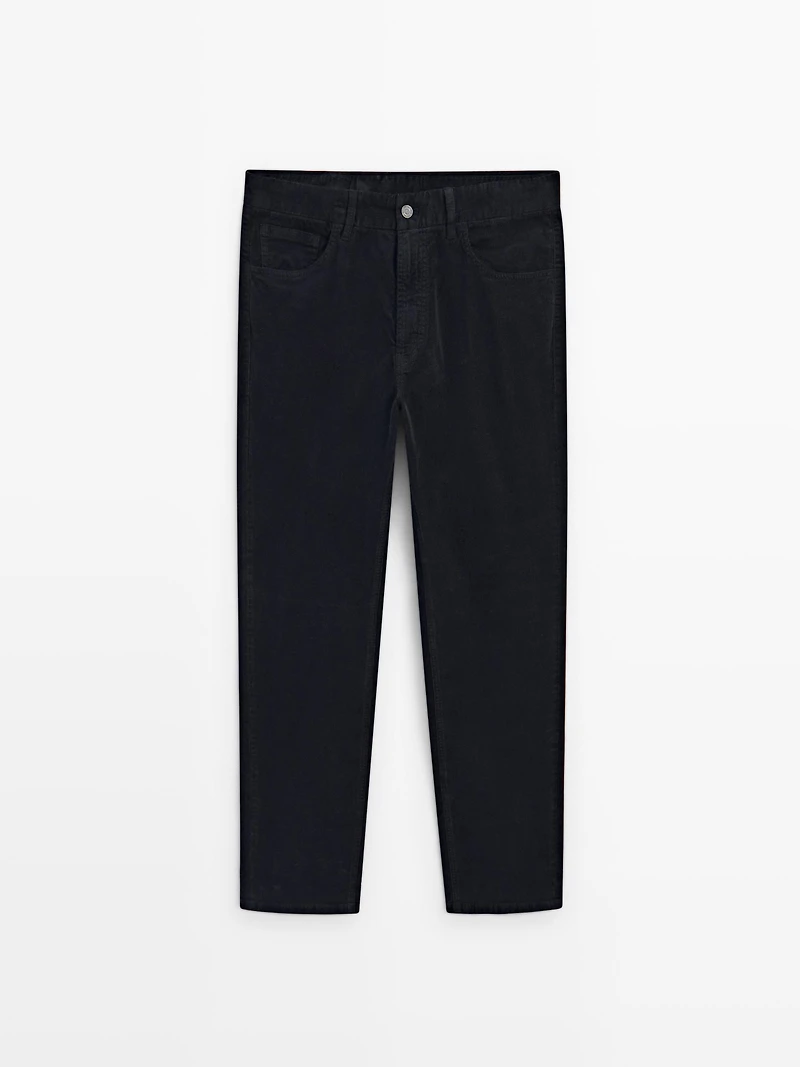 Faux jean en velours côtelé coupe slim