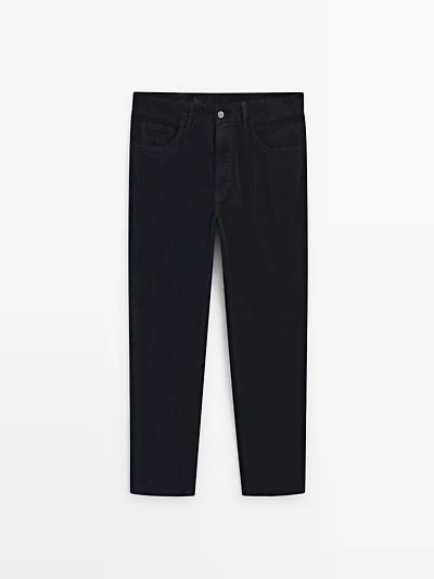 Faux jean en velours côtelé coupe slim
