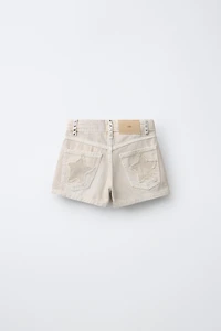 STAR STUDDED DENIM SHORTS