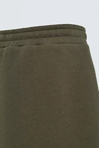 WIDE FIT NEOPRENE EFFECT PANTS WITH STUDS