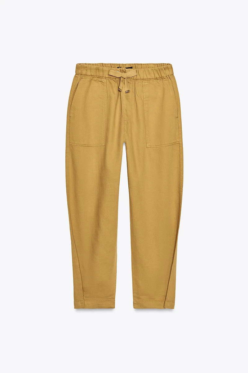 JOGGER PANTS WITH BUTTONED HEM