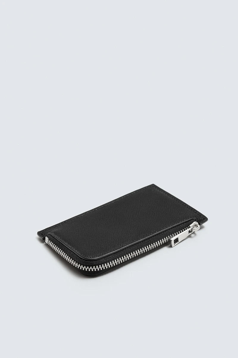 EMBOSSED CARDHOLDER