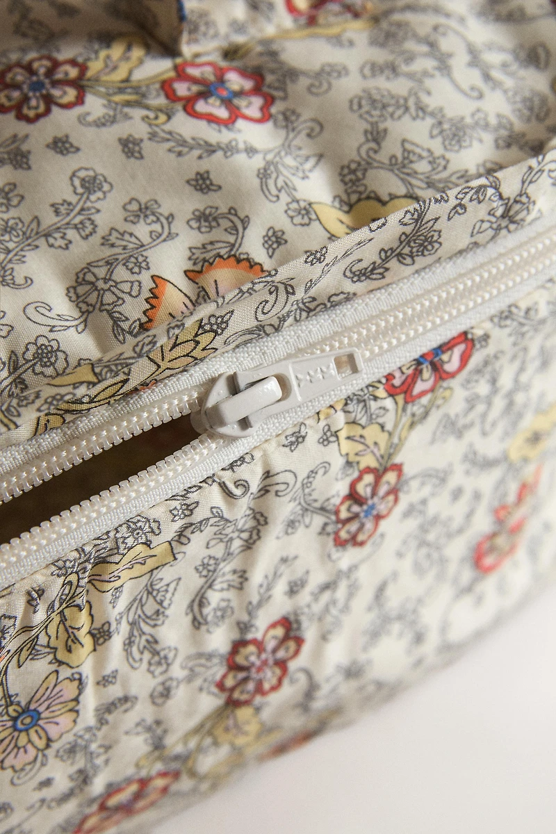 KIDS’ FLORAL MAKEUP BAG