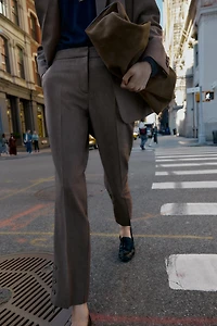 PANTS WITH BUTTONED HEM
