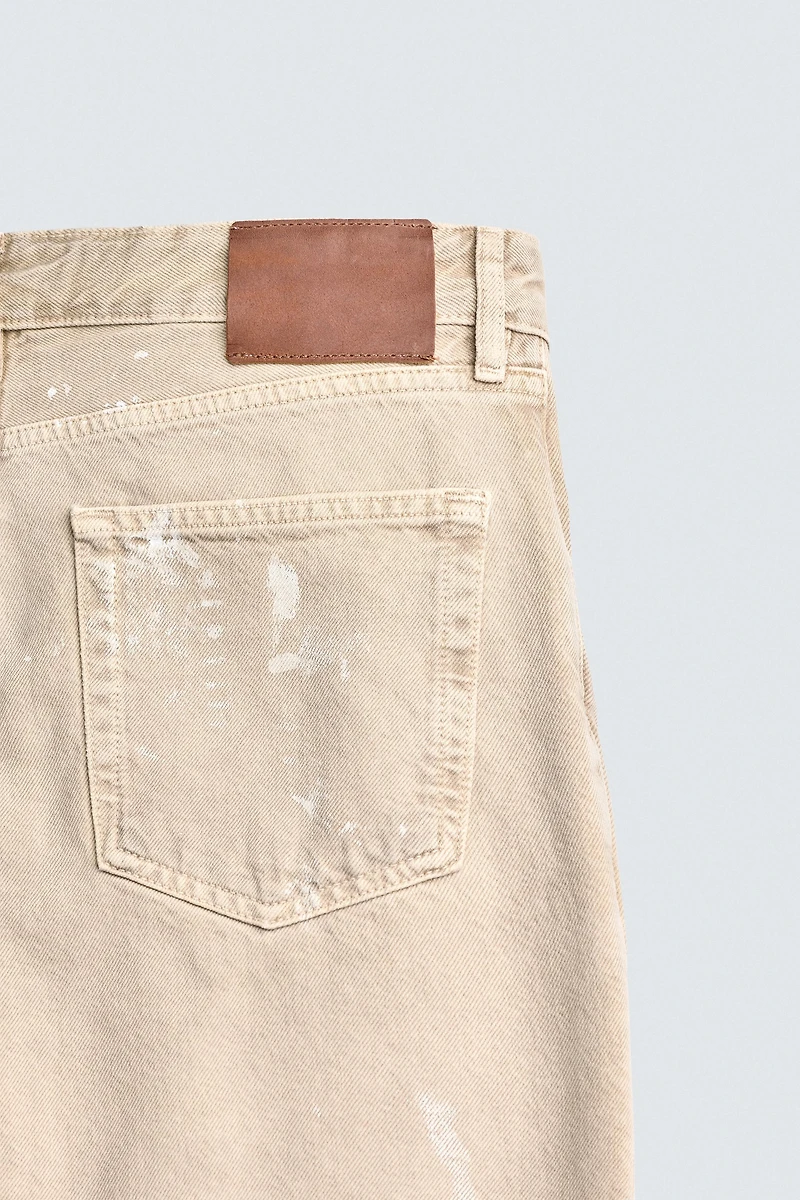 PAINT SPLATTER FLARE FIT JEANS