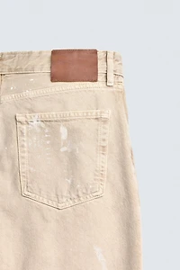 PAINT SPLATTER FLARE FIT JEANS