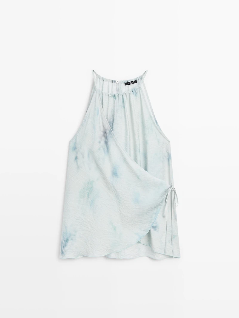 Flowing halterneck top with tie detail