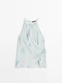 Flowing halterneck top with tie detail