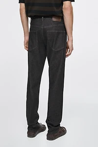Lightweight tapered fit desized jeans