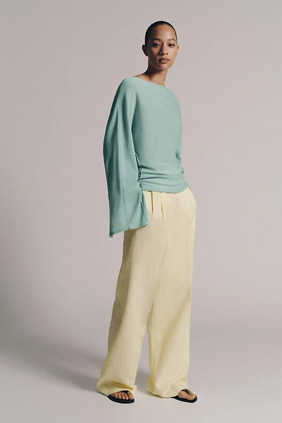 PULL EN MAILLE AVEC OUVERTURES SUR MANCHES