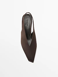 Heeled slingback shoes