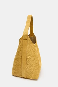 SAC EN CUIR DAIM TRESSÉ