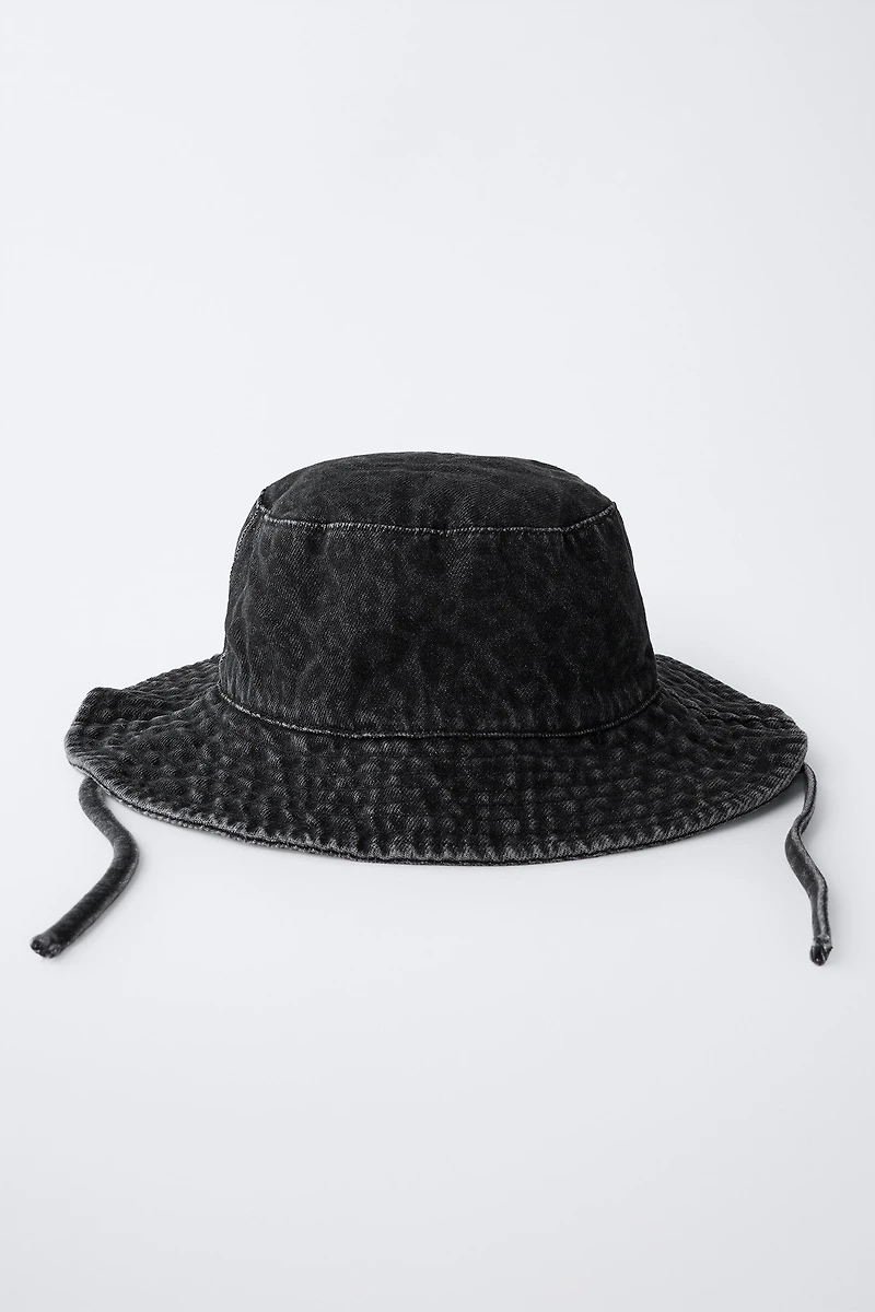 DENIM ANIMAL PRINT BUCKET HAT