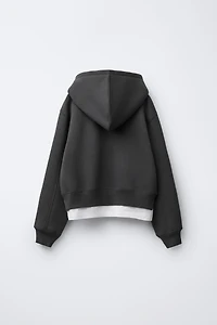 VARSITY DOUBLE HEM HOODED SWEATSHIRT