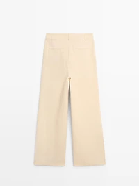 Wide-leg linen trousers with pocket detail