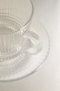 COFFEE CUP AND SAUCER WITH RAISED GEOMETRIC DESIGN