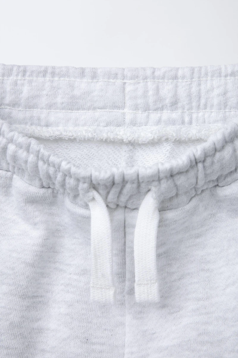 PANTALON DE JOGGING À BANDES LATÉRALES