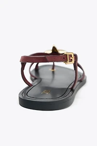 STRAPPY SANDALS WITH METALLIC DETAIL