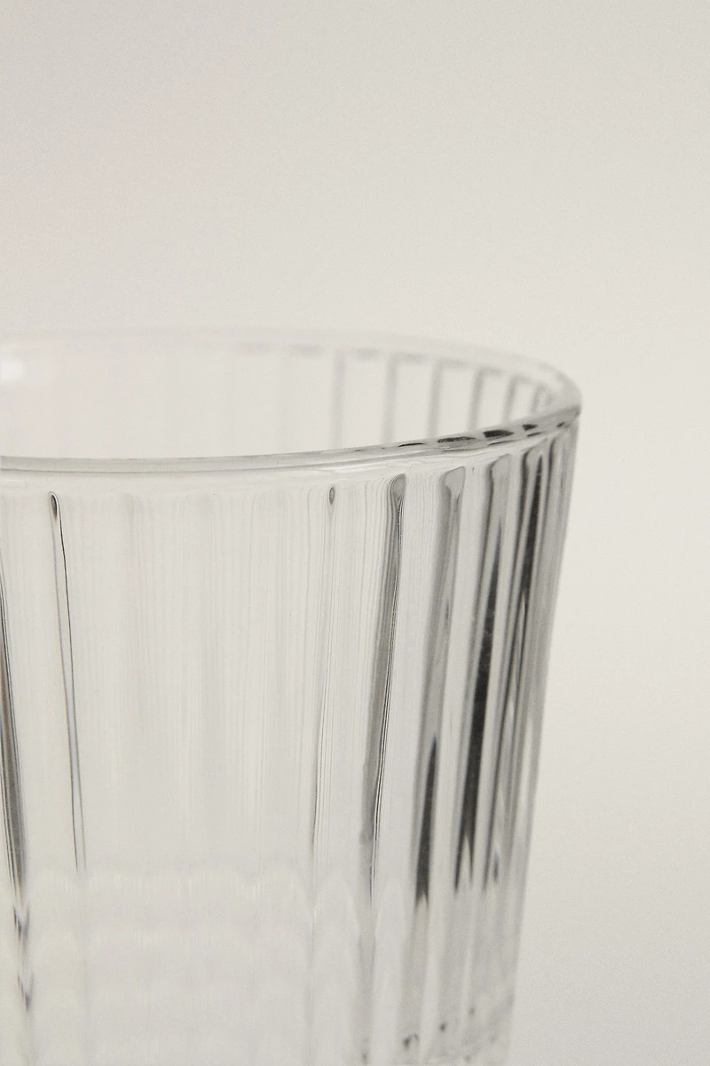 GLASS TUMBLER WITH RAISED GEOMETRIC DESIGN