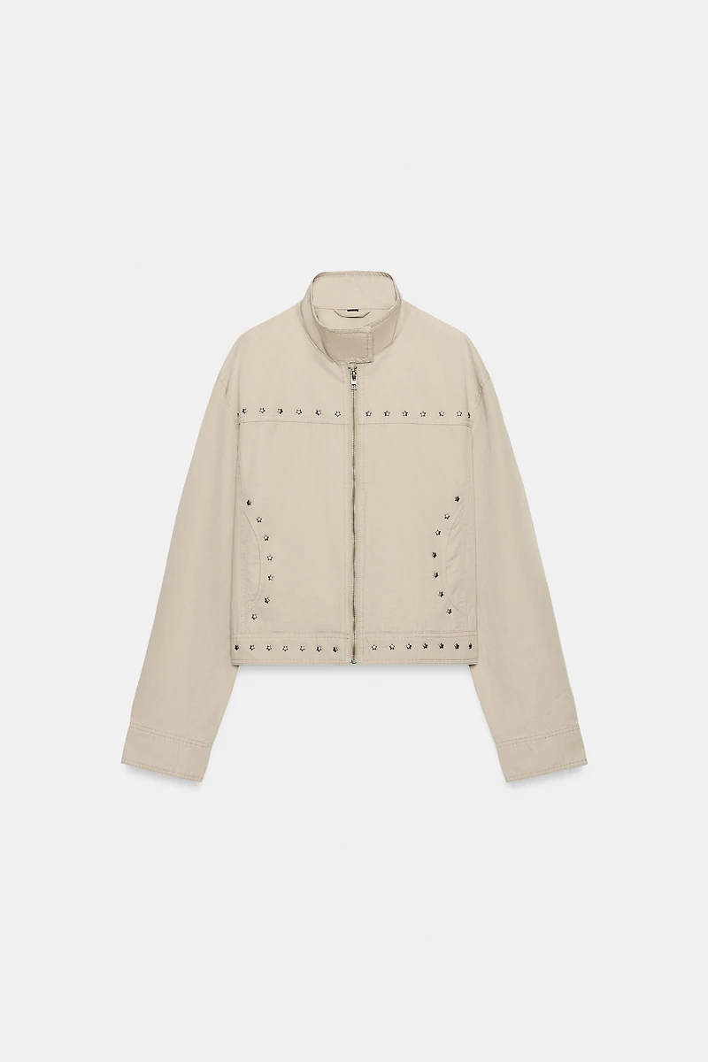VESTE EFFET DÉLAVÉ À CLOUS