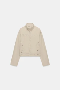 VESTE EFFET DÉLAVÉ À CLOUS