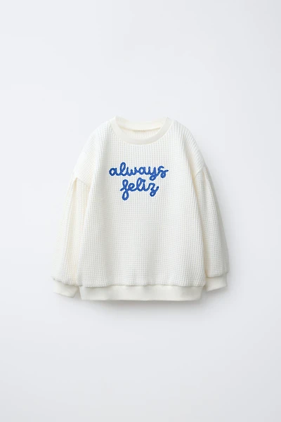 EMBROIDERED WAFFLE SWEATER