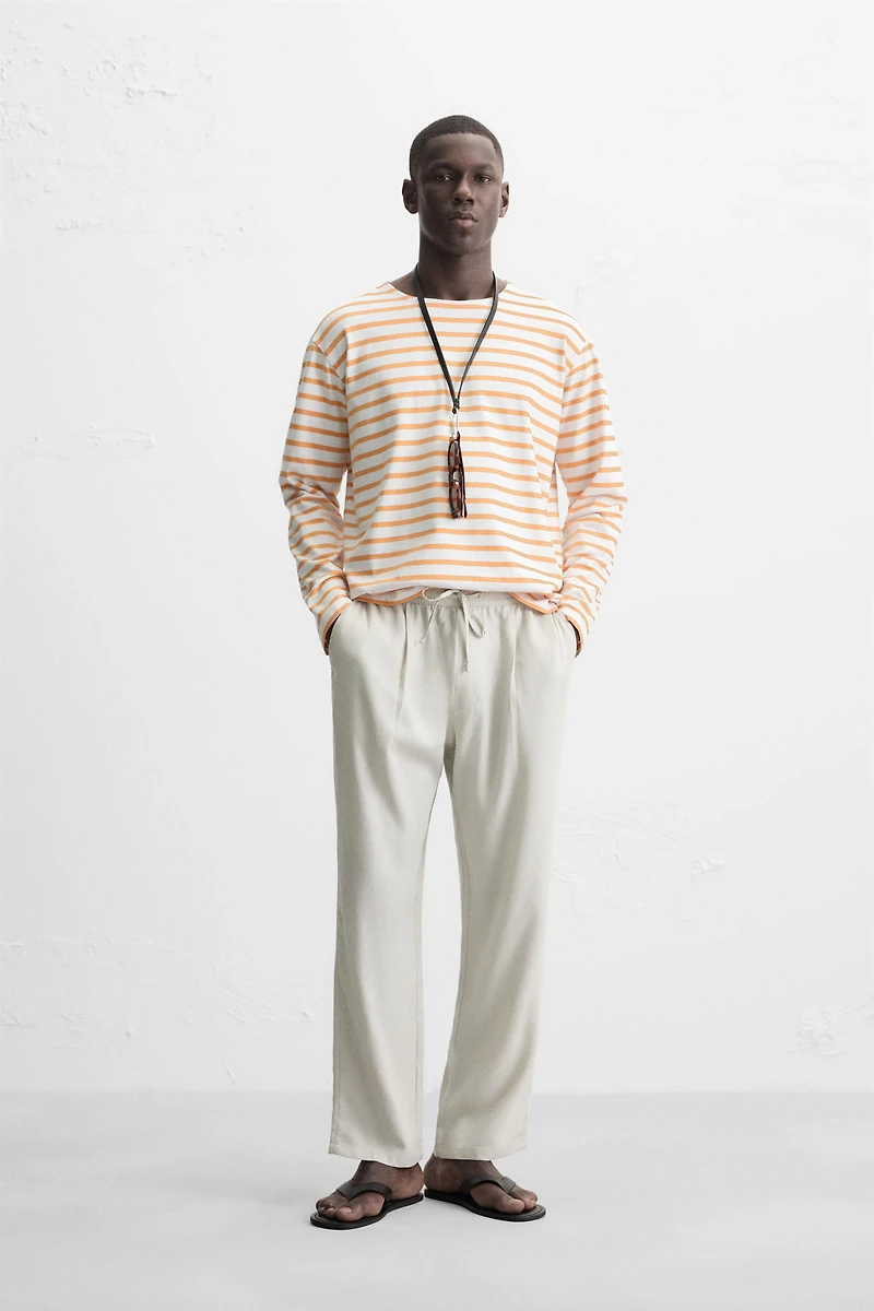 RELAXED FIT FLOWY PANTS