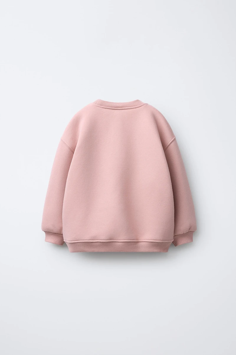 CROCHET APPLIQUÉ SWEATSHIRT