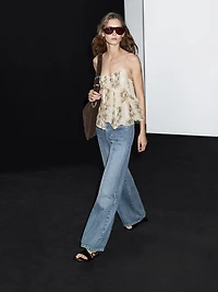 Ruffled snakeskin print top with gathered detail