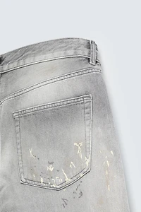 RELAXED FIT SPLATTER JEANS