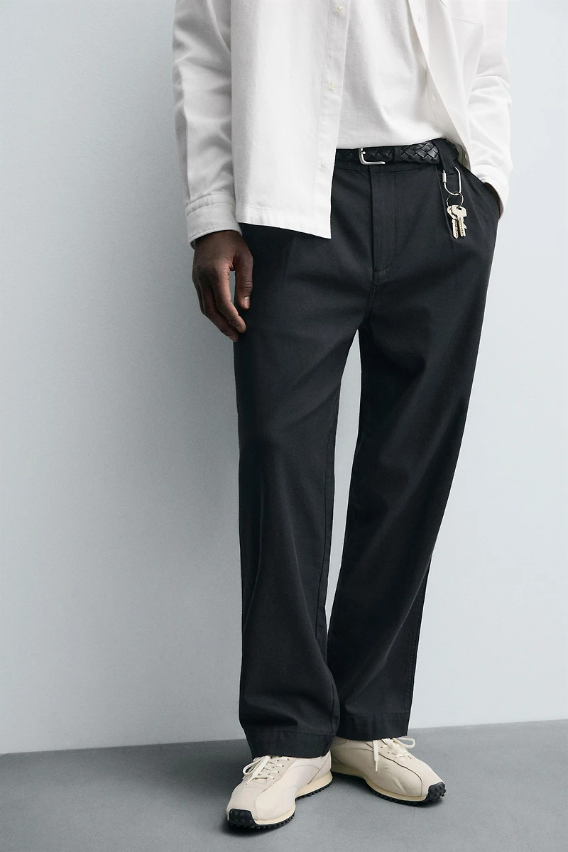 RELAXED FIT PLEATED PANTS